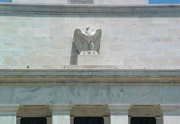 The Federal Reserve and ten banks enter foreclosure pact.