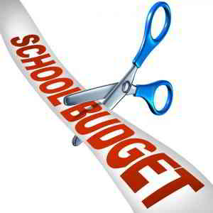 cutting school budget ribbon