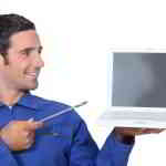 man with wrench and laptop