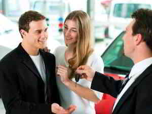couple buying a car