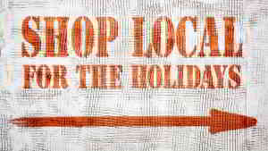 shop local for the holidays sign