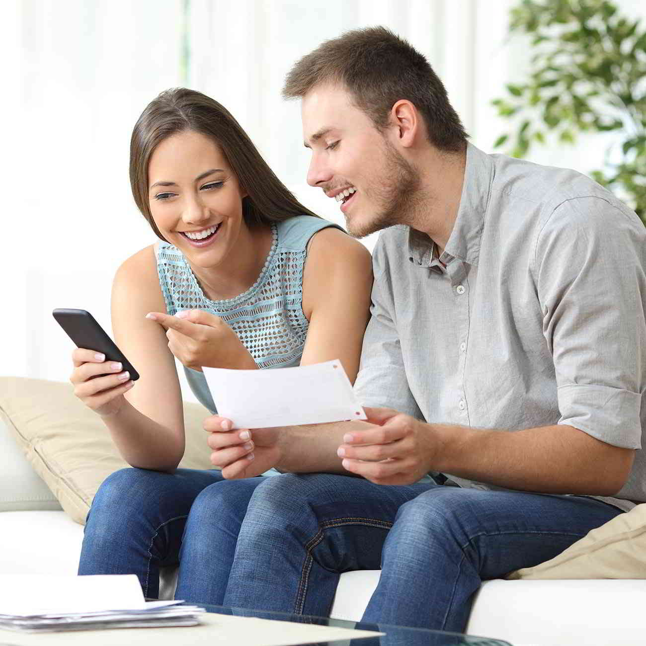 couple reviewing cell phone bill