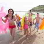 family on beach vacation