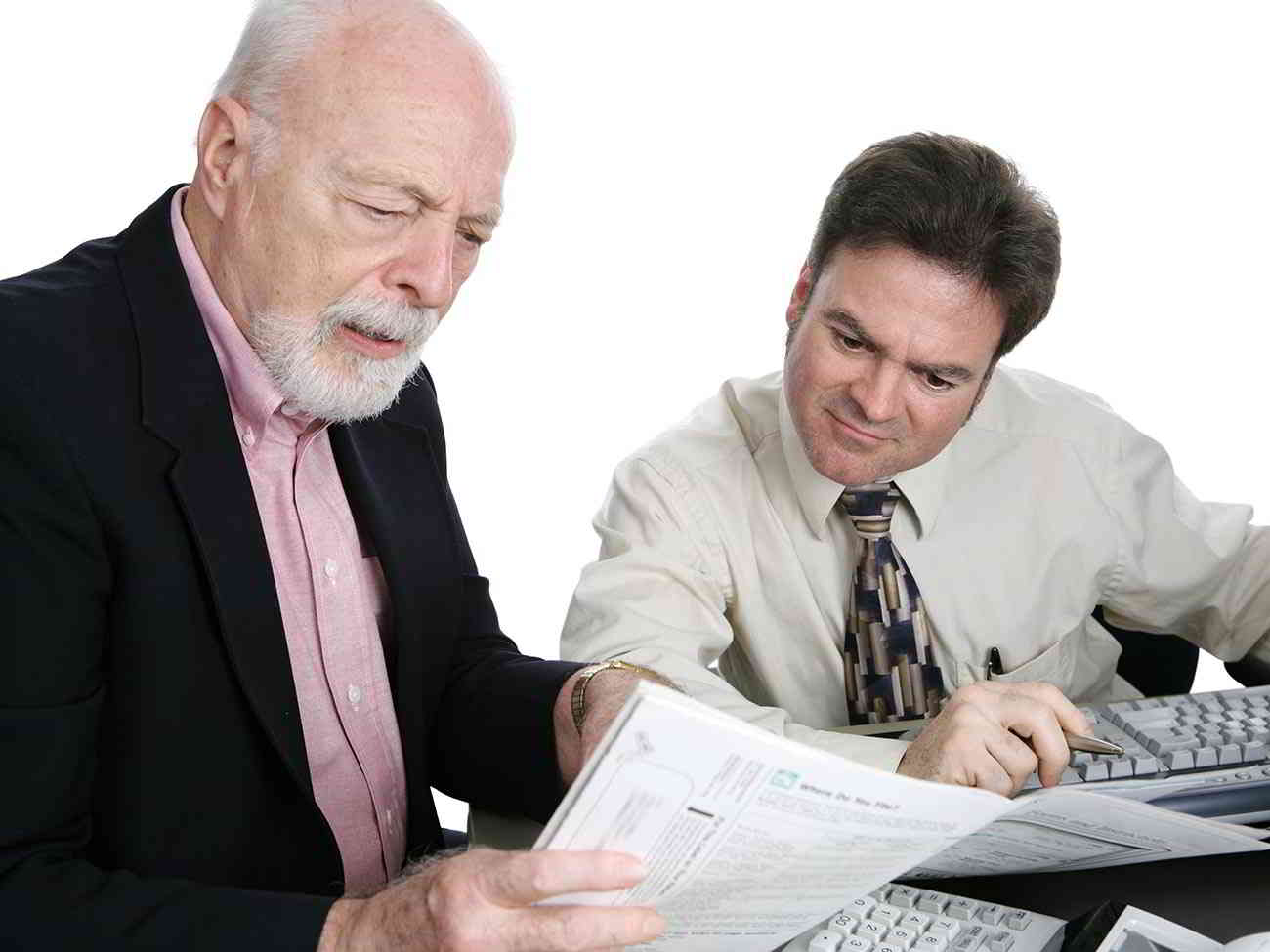 retired man reviewing tax return