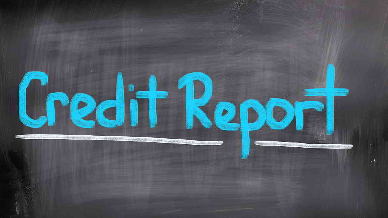 credit report written on chalkboard