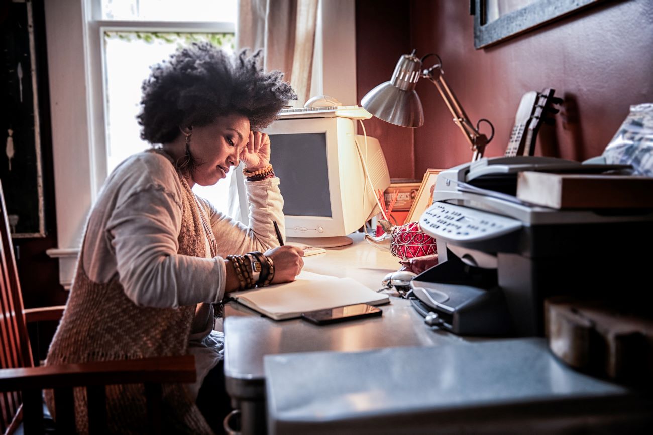 a woman works on her budget