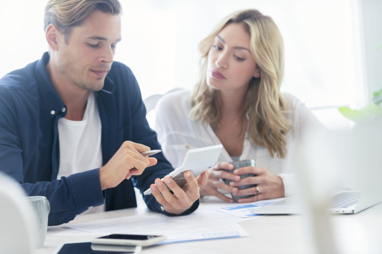 Young couple applying for a personal loan online