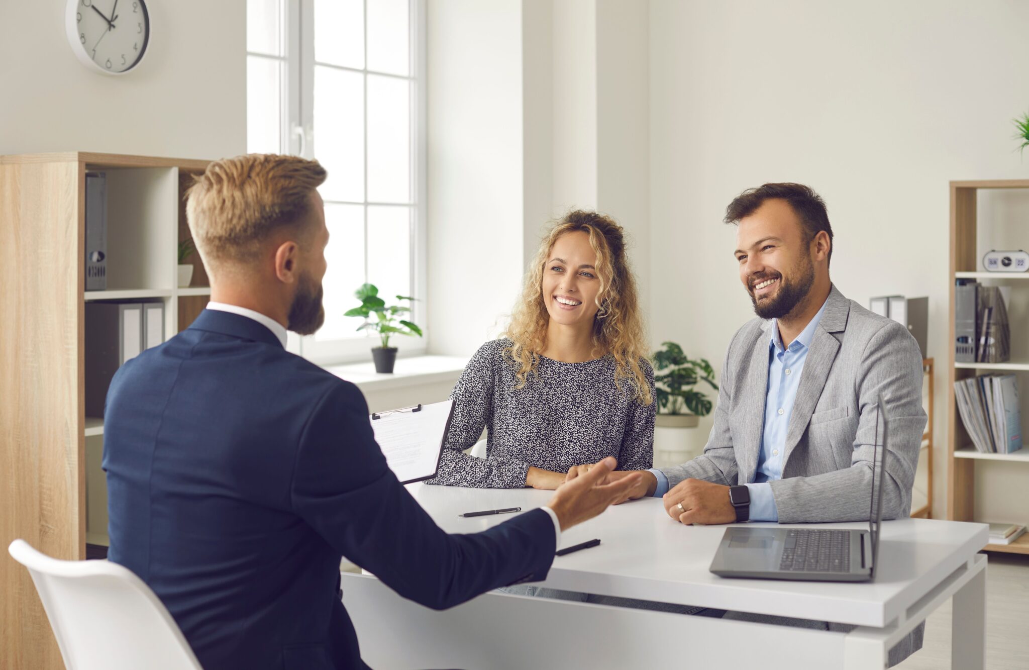 couple having a meeting with the loan manager